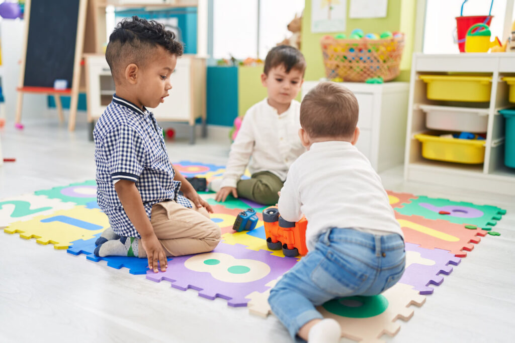 a group of kids playing on the floor